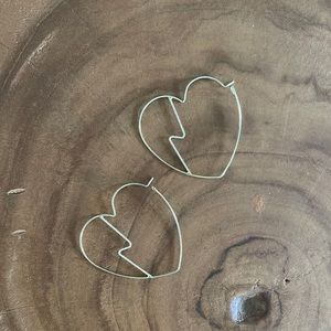 Thin gold heart shaped earrings